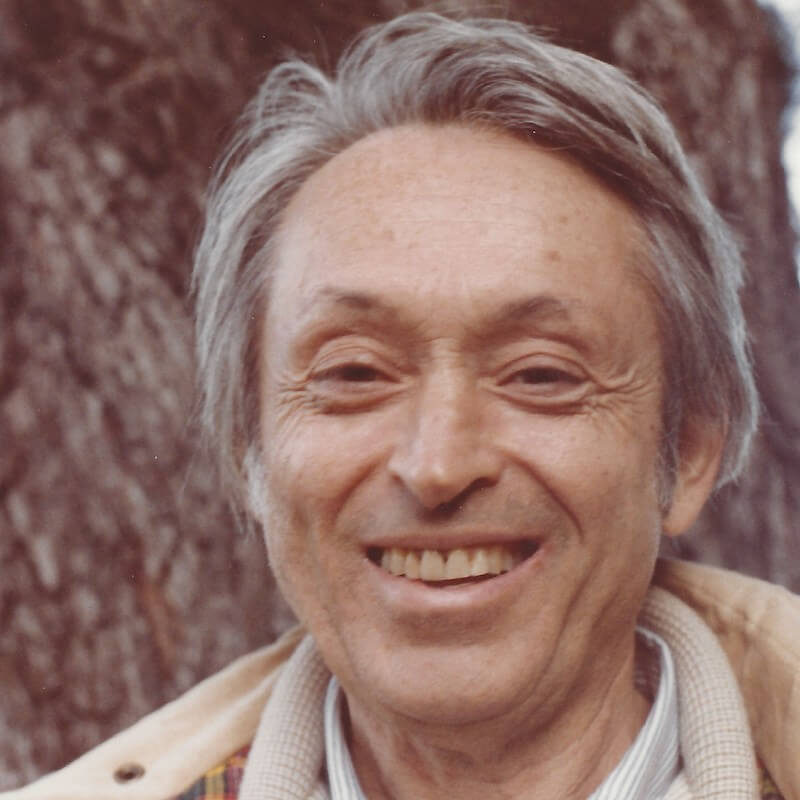 Mendek Rubin smiling headshot 2